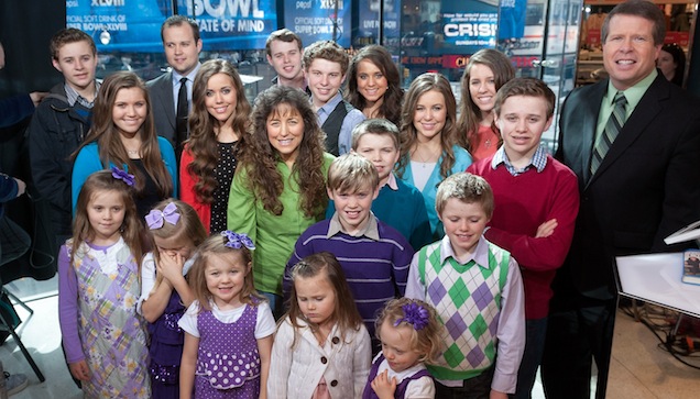 NEW YORK, NY - MARCH 11:  The Duggar family visits "Extra" at their New York studios at H&M in Times Square on March 11, 2014 in New York City.  (Photo by D Dipasupil/Getty Images for Extra)