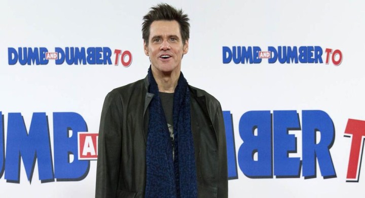 US actor Jim Carrey poses for photographers at a photocall for the film "Dumb and Dumber To" in London on November 20, 2014. AFP PHOTO / JUSTIN TALLIS        (Photo credit should read JUSTIN TALLIS/AFP/Getty Images)
