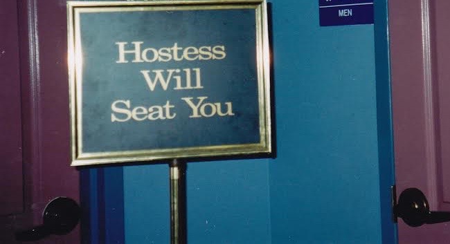 Hostess will seat you - men's room