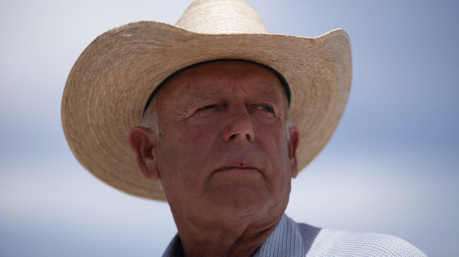 Rancher Cliven Bundy speaks at a protest area near Bunkerville, Nev. Wednesday, April 16, 2014. (AP Photo/Las Vegas Review-Journal, John Locher)