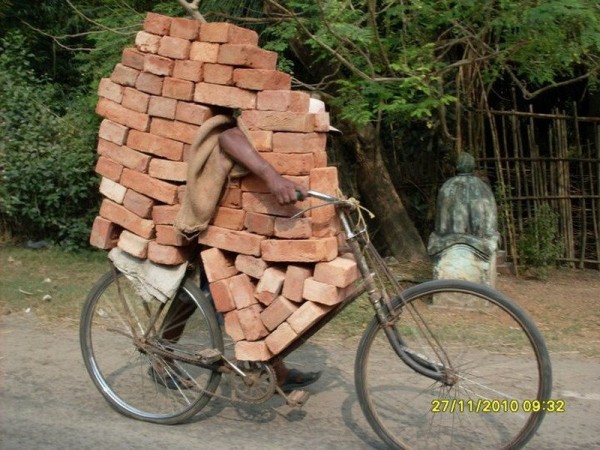 transportation-of-bricks-on-a-bike-600x450