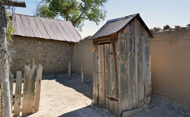 This Tuesday, Sept. 29, 2015, photo shows a 19th century-era outhouse at Casa San Ysidro in Corrales, N.M. At a time when life could be harsh in the American Southwest, outhouses served more than one important role. They provided structure, protected water resources and created important social norms, a New Mexico professor says.  (AP Photo/Russell Contreras)