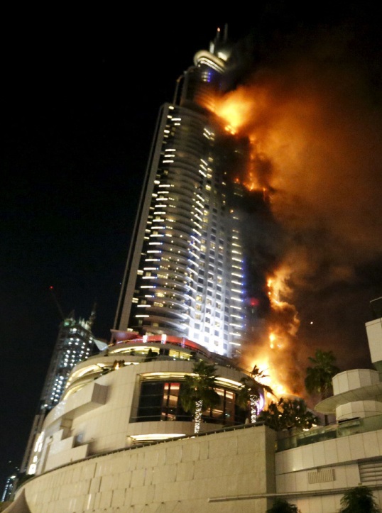 A fire engulfs The Address Hotel in downtown Dubai in the United Arab Emirates December 31, 2015. REUTERS/Ahmed Jadallah      TPX IMAGES OF THE DAY
