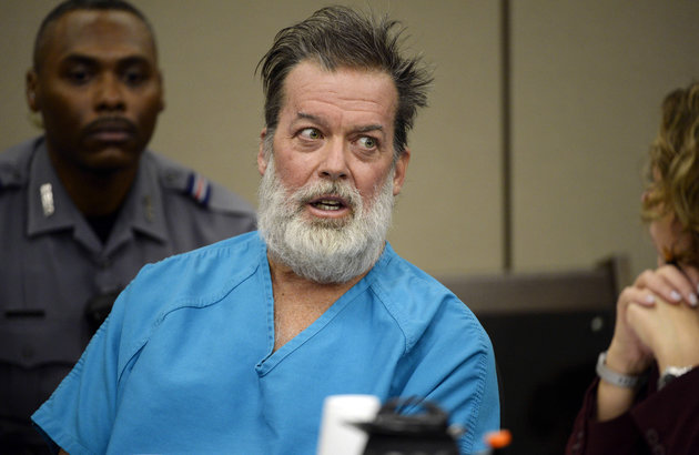 FILE - In this Dec. 9, 2015, file photo, Robert Dear, center, talks during a court appearance in Colorado Springs, Colo. The man who admitted killing multiple people at a Colorado Planned Parenthood clinic is returning to court for the continuation of a hearing on whether he's mentally competent to stand trial. A psychologist who examined Dear is scheduled to testify Tuesday, May 10, 2016. (Andy Cross/The Denver Post via AP, Pool, File)