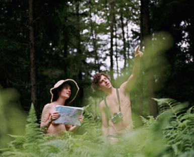 Nude Couple with Map in Forest
