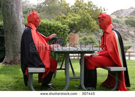 stock-photo-two-devils-eating-lunch-307445