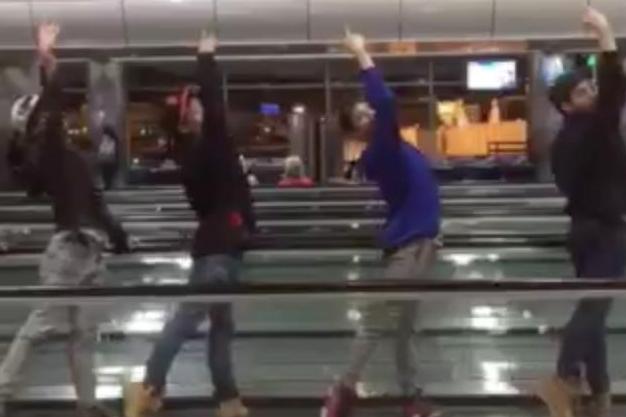 ballet-group-performs-on-moving-walkway-at-denver-airport