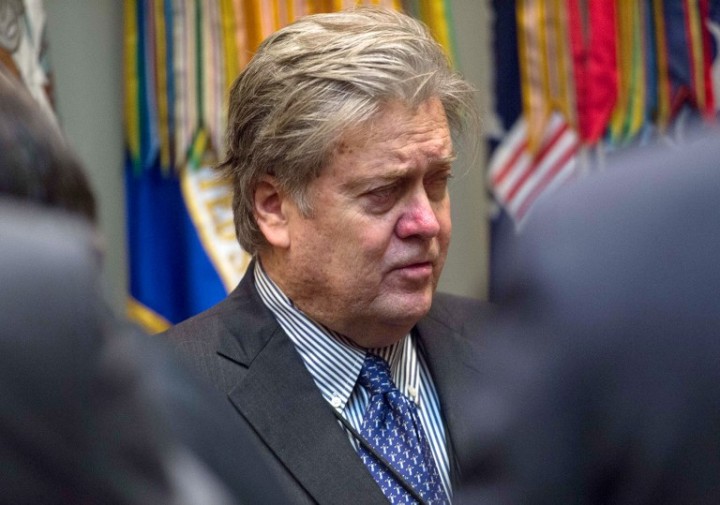 US President Donald Trump's Senior Counselor Steve Bannon waits for the start of Trump's meeting with business leaders in the Roosevelt Room at the White House in Washington, DC, on January 23, 2017. / AFP PHOTO / NICHOLAS KAMM