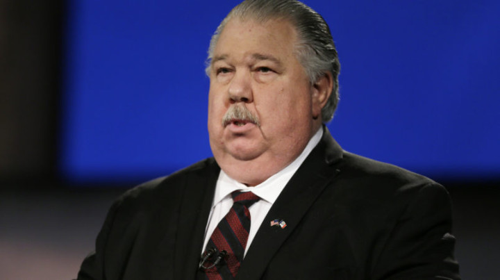 Iowa Republican senatorial candidate college professor Sam Clovis looks on before a live televised debate at Iowa Public Television studios, Thursday, April 24, 2014, in Johnston, Iowa. (AP Photo/Charlie Neibergall)
