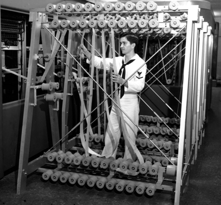 Navy technicians stand at the rear of the Automatic Sequence controlled calculator in Cambridge, Mass., on Aug. 7, 1944.  The calculator was developed by International Business Machines Corp.  (AP Photo)