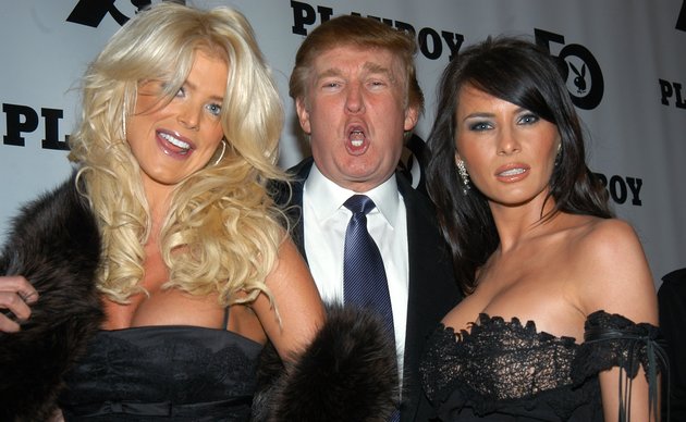 UNITED STATES - DECEMBER 05:  Donald Trump is flanked by Victoria Silvstedt, 1997 Playmate of the Year, and his girlfriend, Melania Knauss, at Playboy magazine's 50th anniversary celebration at the Lexington Ave. armory.  (Photo by Richard Corkery/NY Daily News Archive via Getty Images)