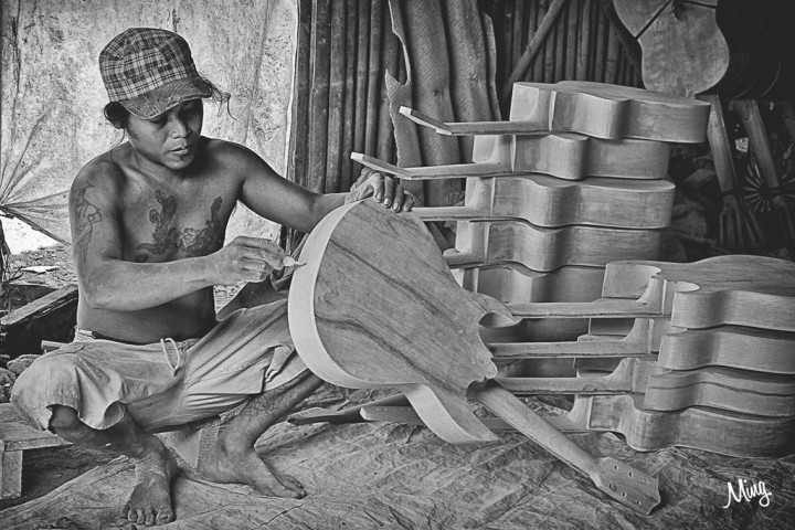 the_guitar_maker_by_a177ing-d68c8yr