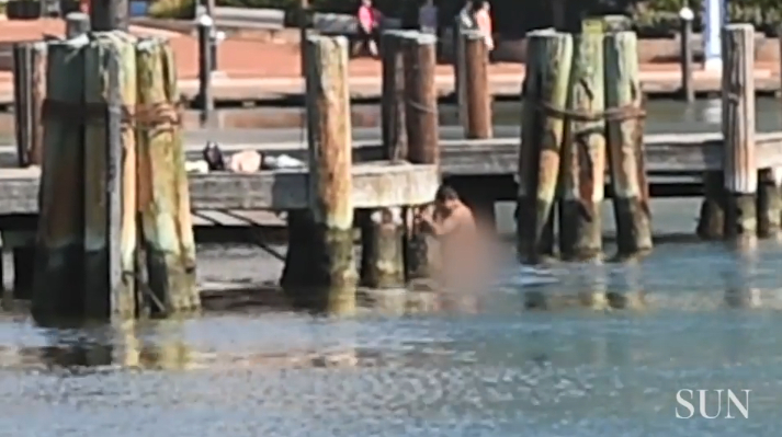 Man_swims_naked_in_Baltimore's_Inner_Harbor_-_Baltimore_Sun_-_2018-07-19_14.02.41