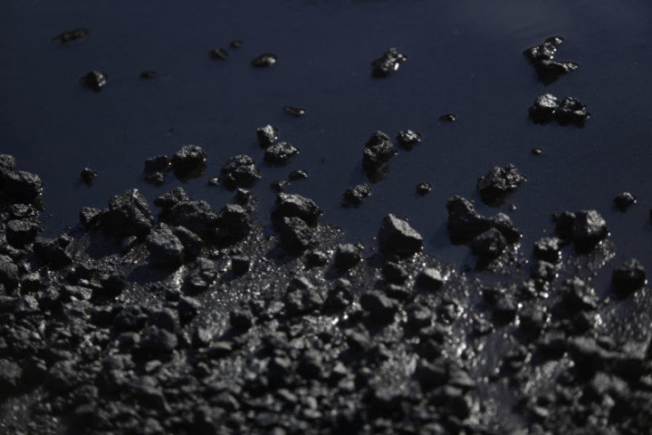 Piece of coking coal sit on the ground at the AK Steel Holding Corp. mill in Middletown, Ohio, U.S., on Friday, Sept. 23, 2016. AK Steel shares rose 3.1 percent this week, compared with the 0.2 percent advance in the Standard & Poor's 500 Index. Photographer: Luke Sharrett/Bloomberg via Getty Images